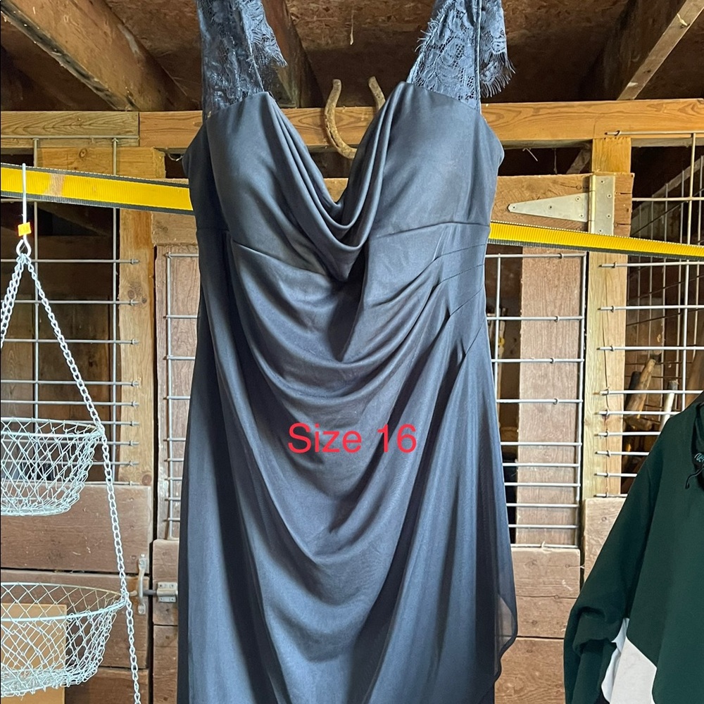 Black cocktail dress size 16, never worn.